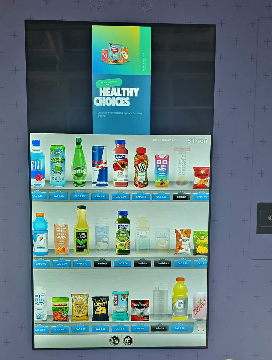 Copious Vending machine touchscreen showing a healthy snacks and drinks lineup